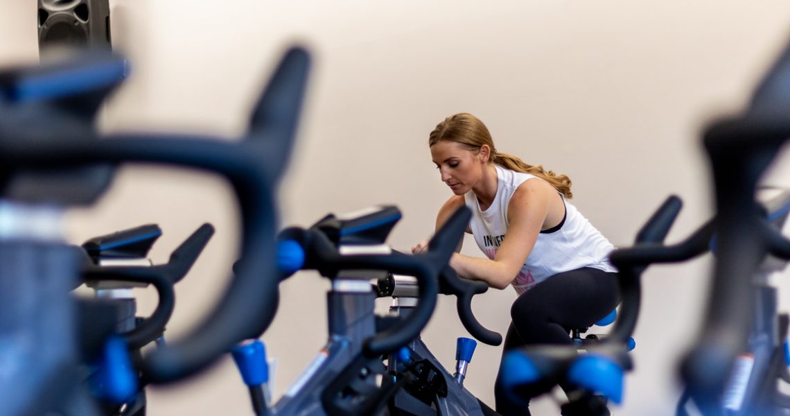 Training On A Spin Bike In The Gym